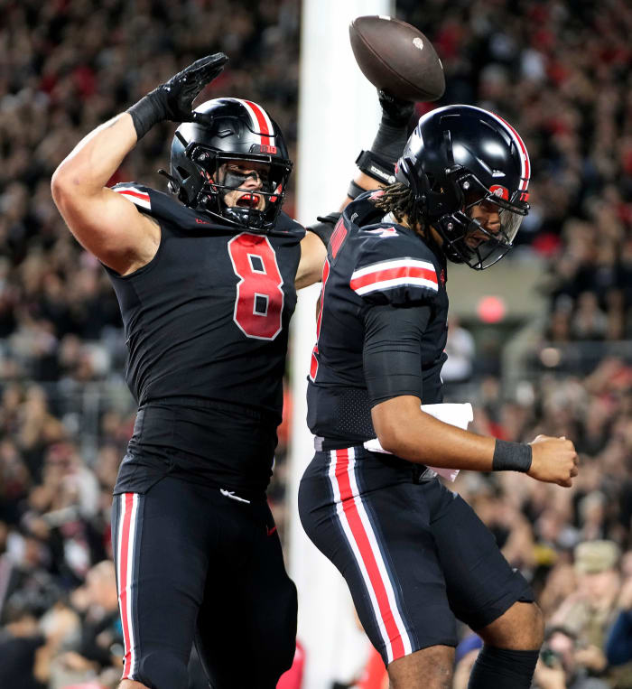 Sep 24, 2022; Columbus, Ohio, USA; Ohio State Buckeyes tight end Cade Stover (8) celebrate his touchdown catch with quarterback C.J. Stroud (7) in the first quarter of the NCAA football game between Ohio State Buckeyes and Wisconsin Badgers at Ohio Stadium.