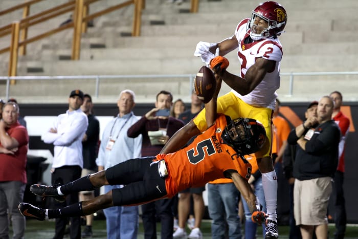 Sep 24, 2022; Corvallis, Oregon, USA; Oregon State Beavers defensive back Alex Austin (5) deflects the ball away from USC Trojans wide receiver Brenden Rice (2) in the second half at Reser Stadium.