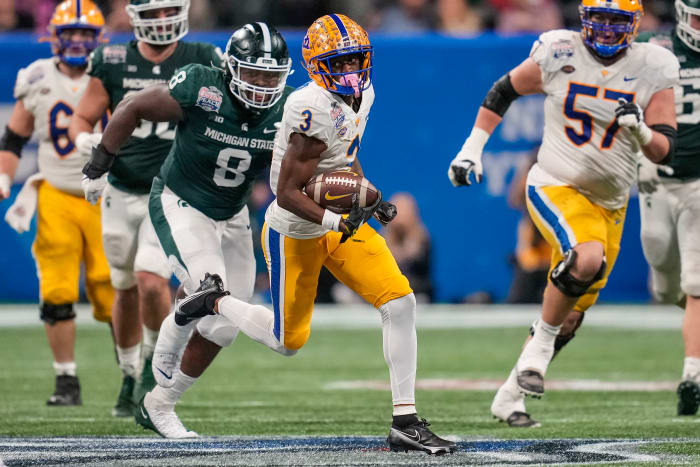 Dec 30, 2021; Atlanta, GA, USA; Pittsburgh Panthers wide receiver Jordan Addison (3) runs with the ball after a catch against the Michigan State Spartans during the first half during the 2021 Peach Bowl at Mercedes-Benz Stadium.