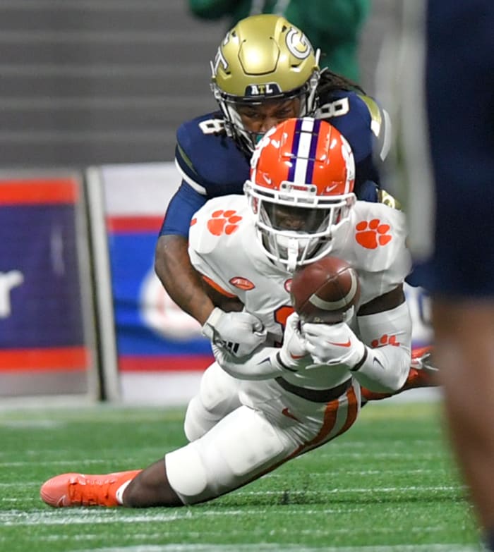 Clemson safety Andrew Mukuba (1) intercepts ball near Georgia Tech wide receiver Nate McCollum (8) during the first quarter at the Mercedes-Benz Stadium in Atlanta, Georgia Monday, September 5, 2022.