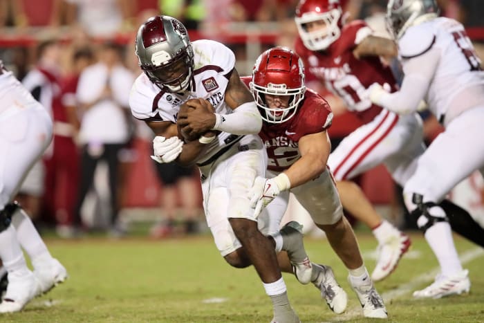 Sep 17, 2022; Fayetteville, Arkansas, USA; Arkansas Razorbacks linebacker Drew Sanders 942) tackles Missouri State Bears quarterback Jason Shelley (3) in the fourth quarter at Donald W. Reynolds Razorback Stadium. Arkansas won 38-27.