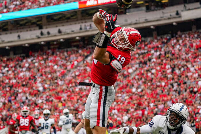 Sep 10, 2022; Athens, Georgia, USA; Georgia Bulldogs tight end Brock Bowers (19) can t hold a pass over Samford Bulldogs safety Wade White (40) in the end zone during the first half at Sanford Stadium.