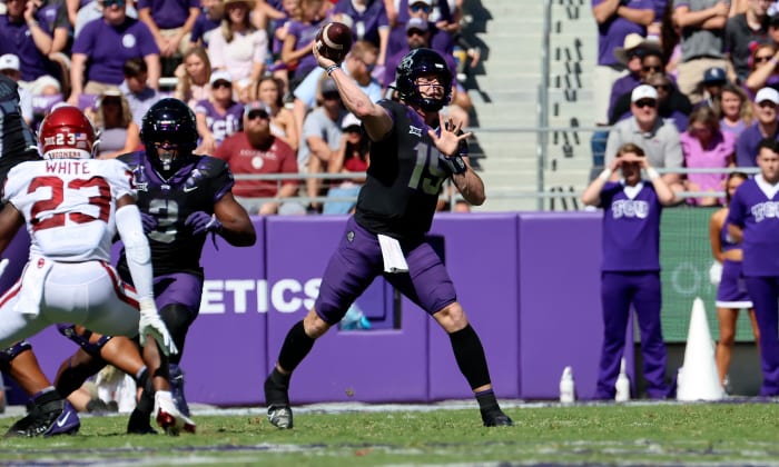 Oct 1, 2022; Fort Worth, Texas, USA; TCU Horned Frogs quarterback Max Duggan (15) throws during the first half against the Oklahoma Sooners at Amon G. Carter Stadium.