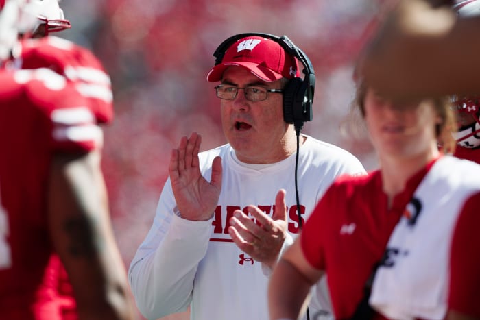 Oct 1, 2022; Madison, Wisconsin, USA; Wisconsin Badgers head coach Paul Chryst encourages his team during the third quarter against the Illinois Fighting Illini at Camp Randall Stadium.