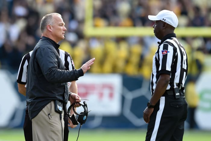 Nov 28, 2015; Atlanta, GA, USA; Georgia Bulldogs head coach Mark Richt talks to the game referee during the game against the Georgia Tech Yellow Jackets during the second half at Bobby Dodd Stadium. Georgia defeated Georgia Tech 13-7. Mandatory Credit: Dale Zanine-USA TODAY Sports