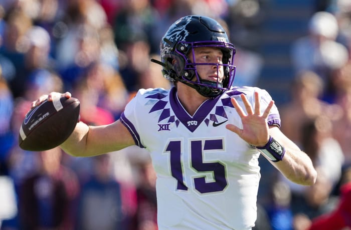 Oct 8, 2022; Lawrence, Kansas, USA; TCU Horned Frogs quarterback Max Duggan (15) throws a pass during the first half against the Kansas Jayhawks at David Booth Kansas Memorial Stadium.