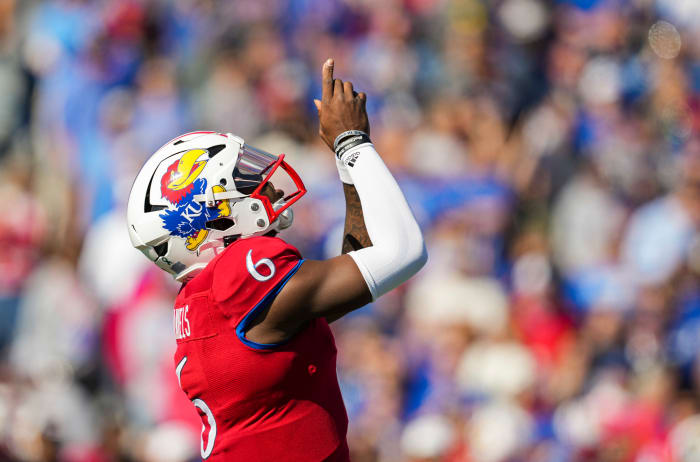 Oct 8, 2022; Lawrence, Kansas, USA; Kansas Jayhawks quarterback Jalon Daniels (6) gets ready before the snap against the TCU Horned Frogs during the first half at David Booth Kansas Memorial Stadium.