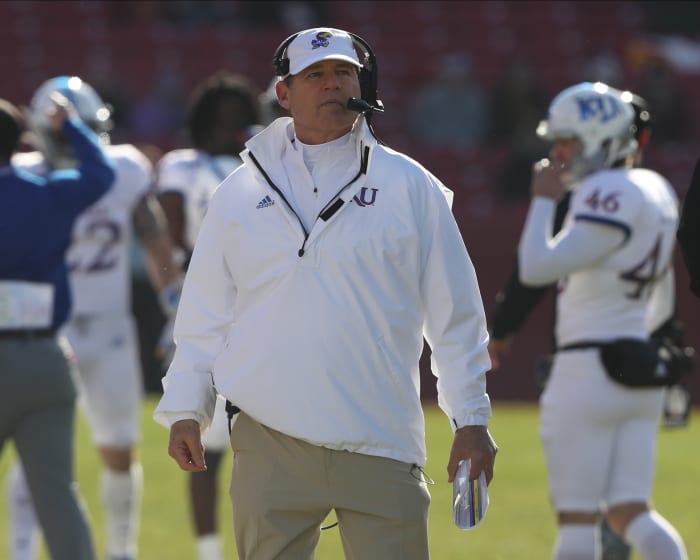 Nov 23, 2019; Ames, IA, USA; Kansas Jayhawks head coach Les Miles watches his team play the Iowa State Cyclones at Jack Trice Stadium.