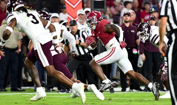Oct 22, 2022; Tuscaloosa, Alabama, USA; Alabama Crimson Tide running back Jahmyr Gibbs (1) runs for a touchdown against the Mississippi State Bulldogs during the first half at Bryant-Denny Stadium.