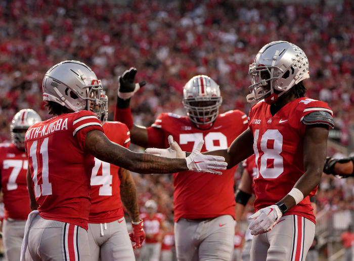 Sep 17, 2022; Columbus, Ohio, USA; Ohio State Buckeyes wide receiver Jaxon Smith-Njigba (11) celebrates with Ohio State Buckeyes wide receiver Marvin Harrison Jr. (18) celebrate Harrison Jr. scored a touchdown during a college football game against the Toledo Rockets at Ohio Stadium.