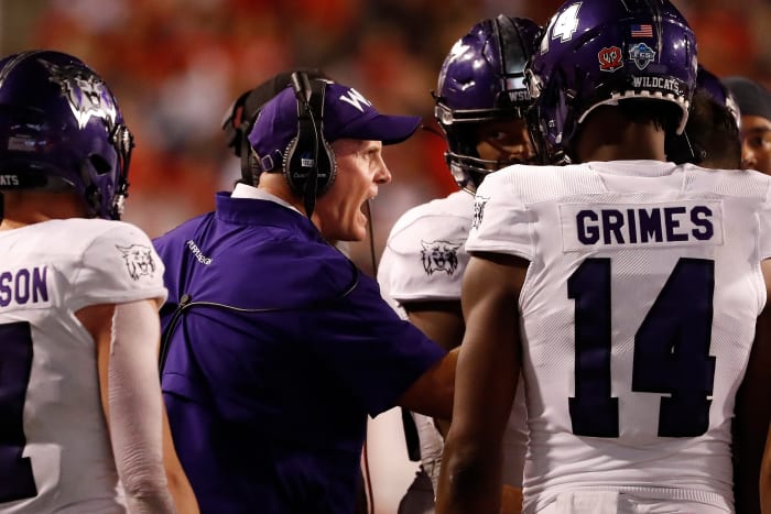 Sep 2, 2021; Salt Lake City, Utah, USA; Weber State Wildcats head coach Jay Hill reacts in the fourth quarter against the Utah Utes at Rice-Eccles Stadium. Mandatory Credit: Jeffrey Swinger-USA TODAY Sports