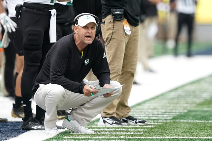 Sep 18, 2021; Berkeley, California, USA; Sacramento State Hornets head coach Troy Taylor kneels on the sideline during the second quarter against the California Golden Bears at FTX Field at California Memorial Stadium.