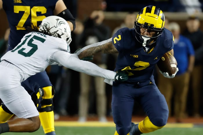 Oct 29, 2022; Ann Arbor, Michigan, USA; Michigan Wolverines running back Blake Corum (2) rushes in the first half against the Michigan State Spartans at Michigan Stadium.