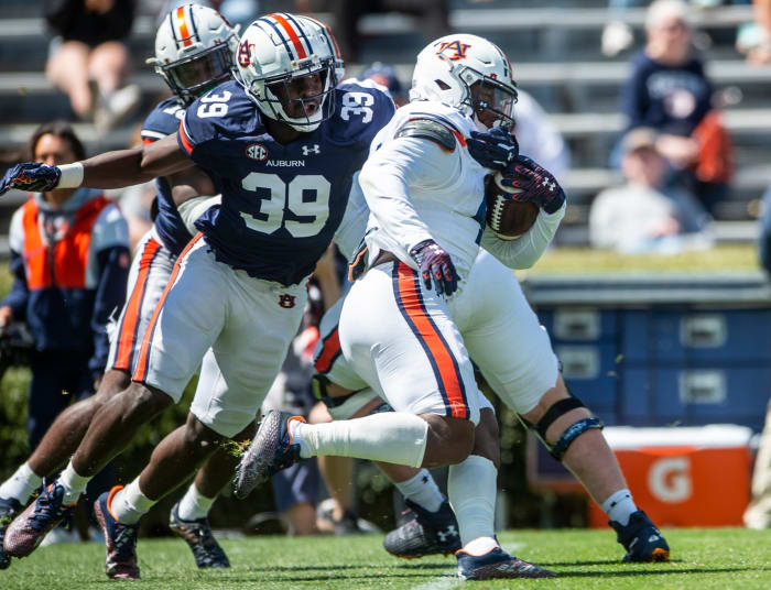 Auburn Tigers edge Dylan Brooks (39) tackles Auburn Tigers running back Sean Jackson (44) during the A-Day spring practice at Jordan-Hare Stadium in Auburn, Ala., on Saturday, April 9, 2022.