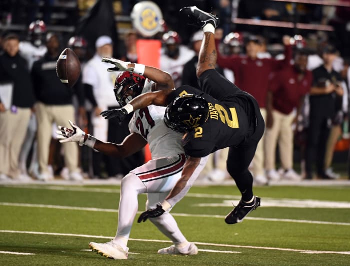 Nov 5, 2022; Nashville, Tennessee, USA; Vanderbilt Commodores running back Ray Davis (2) has a pass broken up by South Carolina Gamecocks defensive back DQ Smith (27) during the first half at FirstBank Stadium.