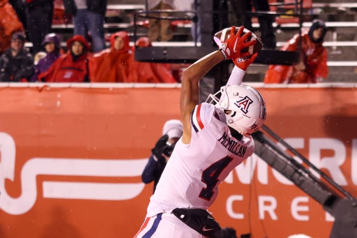Nov 5, 2022; Salt Lake City, Utah, USA; Arizona Wildcats wide receiver Tetairoa McMillan (4) catches a ball to score a two point conversion against the Utah Utes in the fourth quarter at Rice-Eccles Stadium