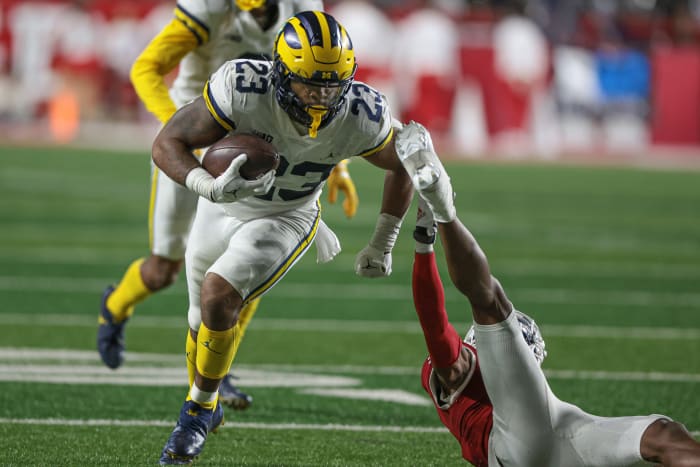 Nov 5, 2022; Piscataway, New Jersey, USA; Michigan Wolverines linebacker Michael Barrett (23) returns an interception during the second half against the Michigan Wolverines at SHI Stadium.