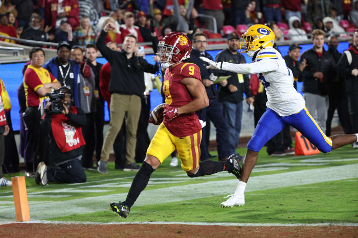 Nov 5, 2022; Los Angeles, California, USA; USC Trojans wide receiver Michael Jackson III (9) scores a touchdown during the third quarter against the California Golden Bears at United Airlines Field at Los Angeles Memorial Coliseum.