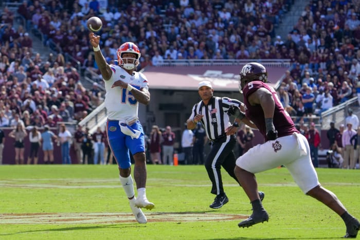 Nov 5, 2022; College Station, Texas, USA; Florida Gators quarterback Anthony Richardson (15) throws a pass in front of Texas A&M Aggies defensive lineman Shemar Turner (5) in the second half at Kyle Field.