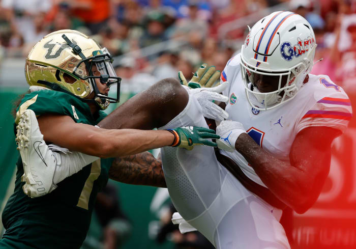 Sep 11, 2021; Tampa, Florida, USA; South Florida Bulls safety Matthew Hill (1) breaks up Florida Gators wide receiver Justin Shorter (4) catch during the first half at Raymond James Stadium.