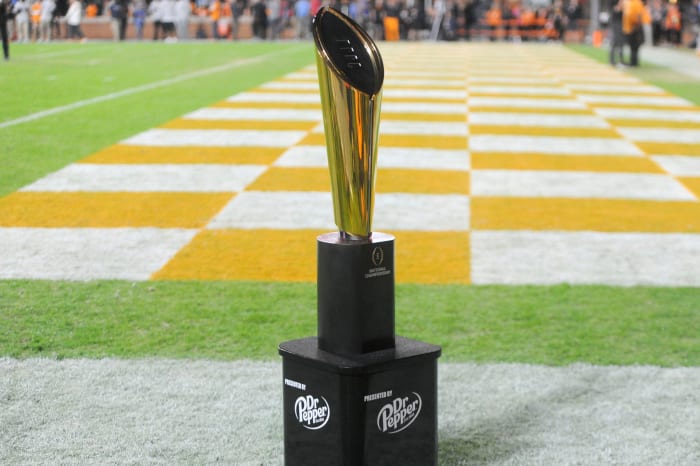 The College Football Playoff National Championship Trophy makes an appearance at the NCAA college football game between Tennessee and Kentucky on Saturday, October 29, 2022 in Knoxville, Tenn.