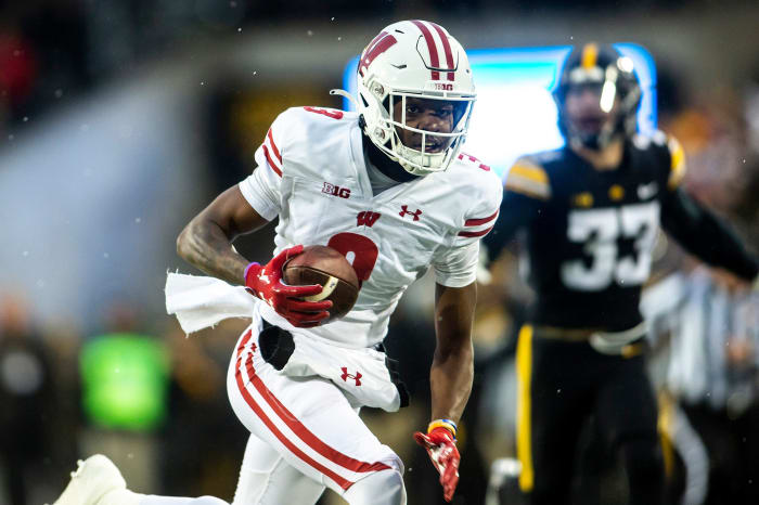 Wisconsin wide receiver Keontez Lewis (3) runs for extra yards on the way to the end zone during a NCAA Big Ten Conference football game against Iowa, Saturday, Nov. 12, 2022, at Kinnick Stadium in Iowa City, Iowa.