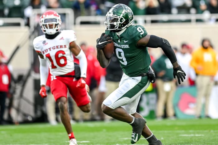 Michigan State's Daniel Barker runs for a touchdown after a catch against Rutgers during the first quarter on Saturday, Nov. 12, 2022, in East Lansing.