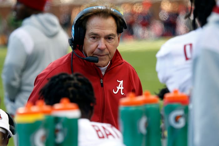 Nov 12, 2022; Oxford, Mississippi, USA; Alabama Crimson Tide head coach Nick Saban talks with players on the sideline during a timeout during the first half at Vaught-Hemingway Stadium.