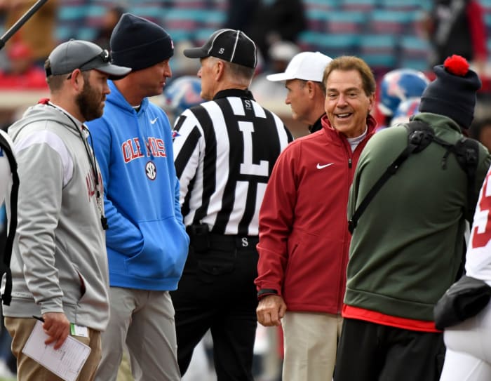 Nov 12, 2022; Oxford, Mississippi, USA; Ole Miss head coach Lane Kiffin and Alabama head coach Nick Saban talk before the game at Vaught-Hemingway Stadium.