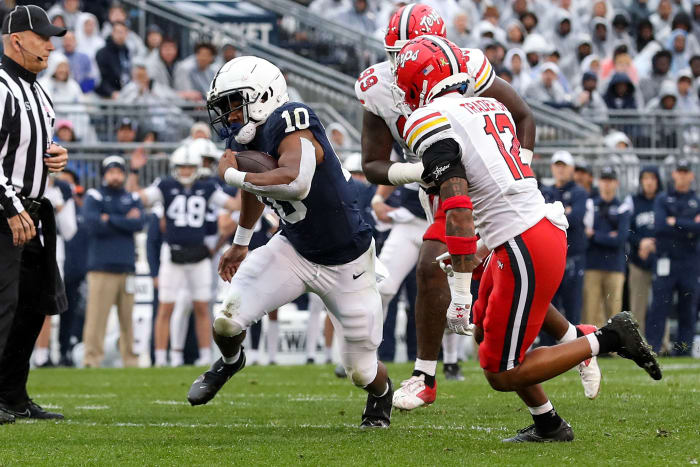 Nov 12, 2022; University Park, Pennsylvania, USA; Penn State Nittany Lions running back Nicholas Singleton (10) runs with the ball during the first quarter against the Maryland Terrapins at Beaver Stadium.