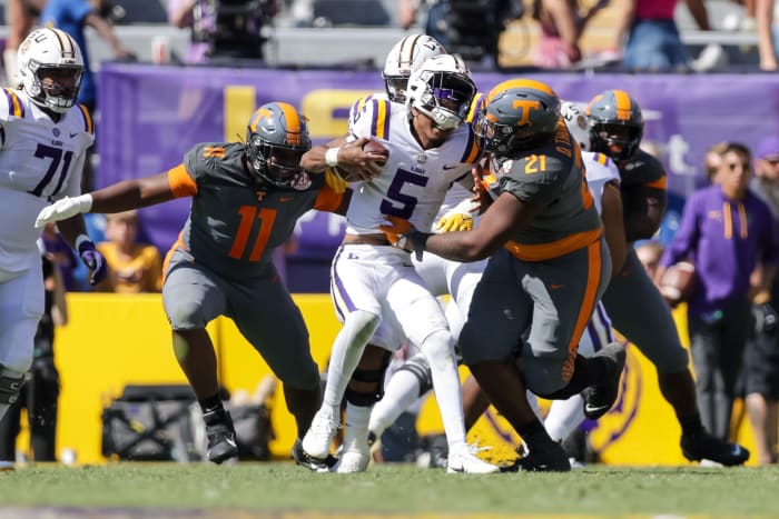 Oct 8, 2022; Baton Rouge, Louisiana, USA; Tennessee Volunteers defensive lineman Omari Thomas (21) sacks LSU Tigers quarterback Jayden Daniels (5) and slams him too the turf that knocks his helmet off during the second half at Tiger Stadium.