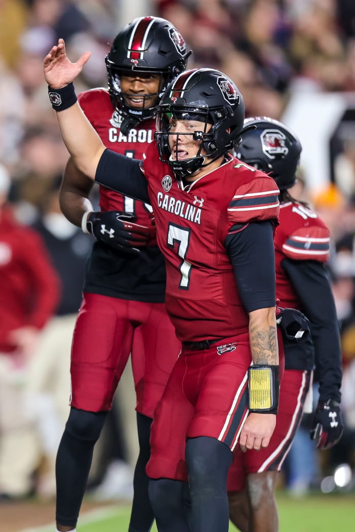 Nov 19, 2022; Columbia, South Carolina, USA; South Carolina Gamecocks quarterback Spencer Rattler (7) celebrates after a touchdown against the Tennessee Volunteers in the second half at Williams-Brice Stadium.