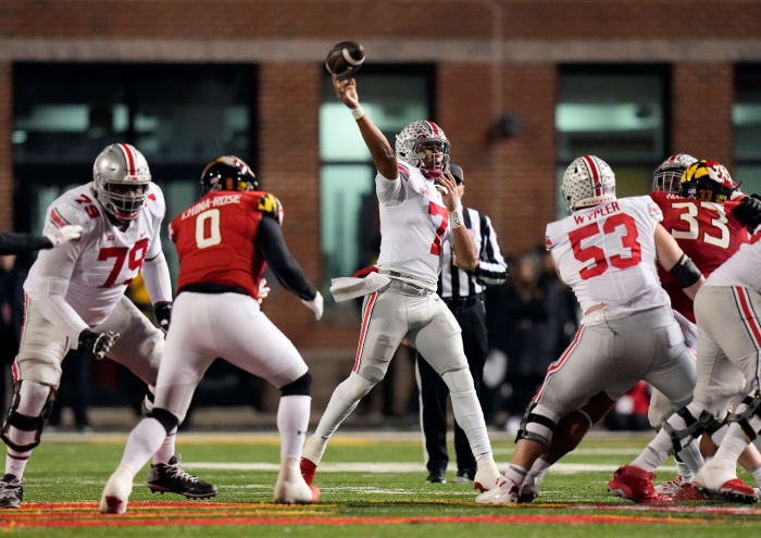 Nov 19, 2022; College Park, MD, USA; Ohio State Buckeyes quarterback C.J. Stroud (7) throws the ball against Maryland Terrapins in the third quarter in their Big Ten game at SECU Stadium.