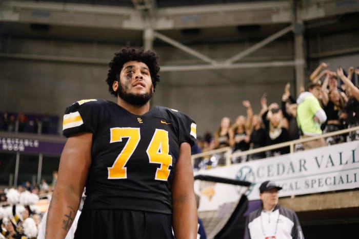 Southeast Polk lineman Kadyn Proctor (74) takes in the final seconds of the Class 5A playoff championships on Friday, Nov. 18, 2022, at the UNI-Dome in Cedar Falls.