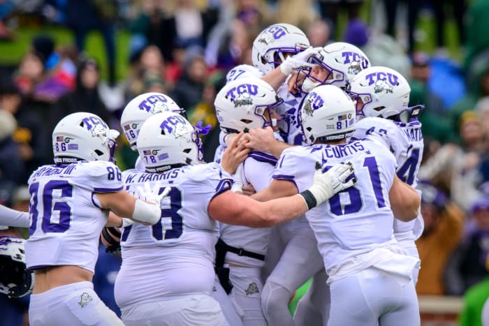 Nov 19, 2022; Waco, Texas, USA; TCU Horned Frogs place kicker Griffin Kell (39) and his teammates celebrate the victory over the Baylor Bears after Kell kicks the game winning field goal against the Bears as time expires at McLane Stadium.