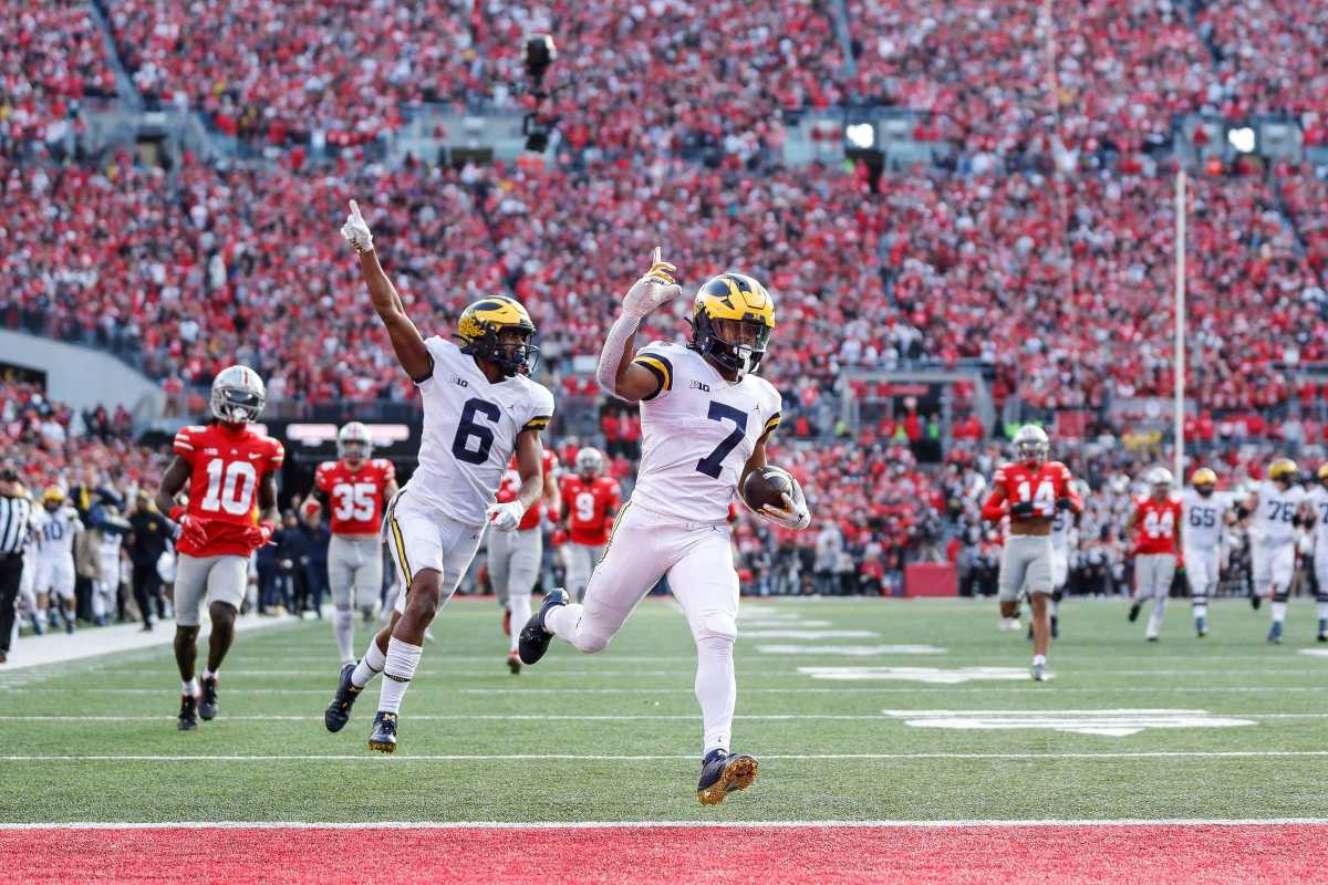 Michigan running back Donovan Edwards (7) runs for a touchdown against Ohio State during the second half at Ohio Stadium in Columbus, Ohio, on Saturday, Nov. 26, 2022. 