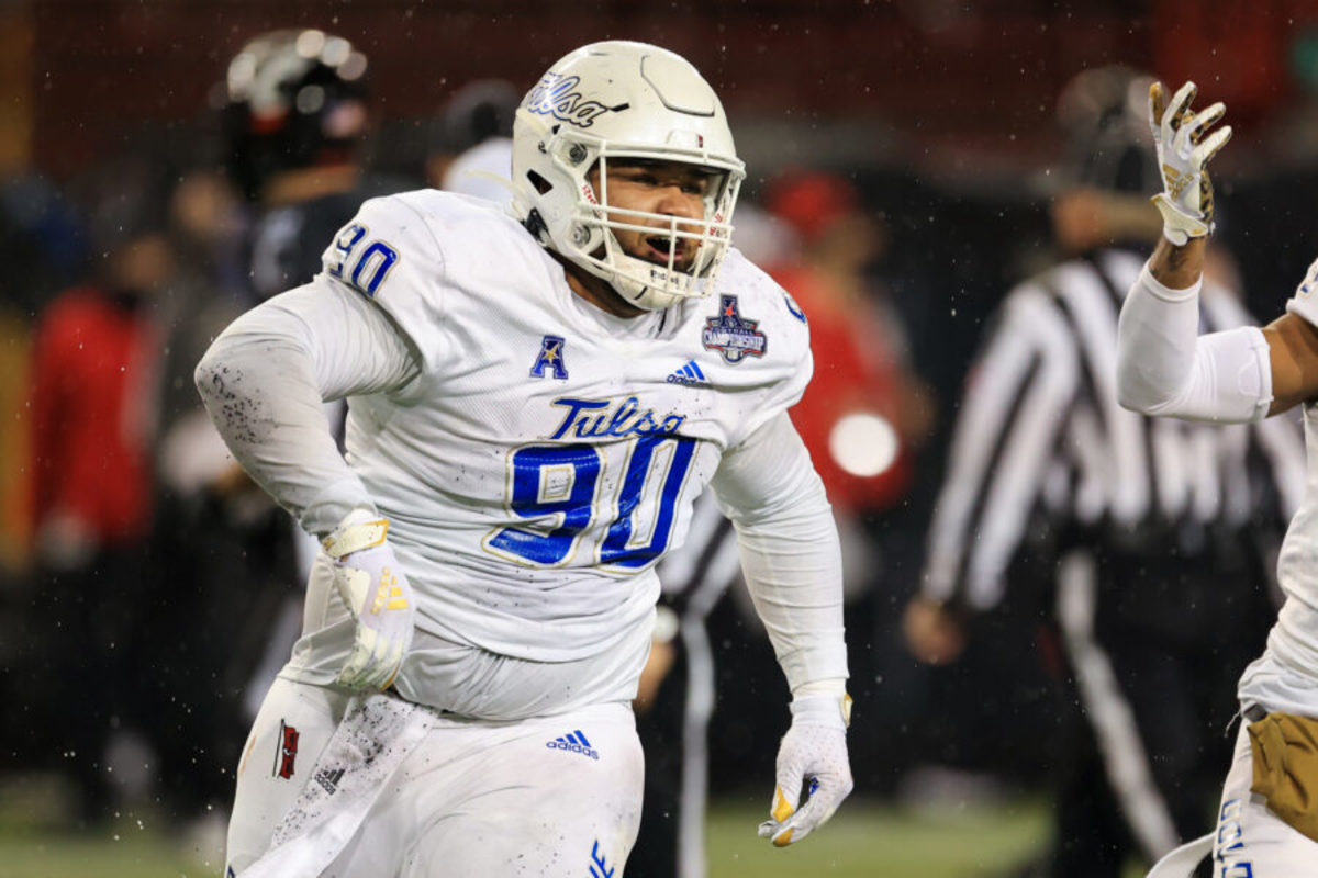 CINCINNATI, OH - DECEMBER 19: Tulsa Golden Hurricane defensive lineman Jaxon Player (90) reacts during the AAC Championship game against the Tulsa Golden Hurricane and the Cincinnati Bearcats on December 19, 2020, at Nippert Stadium in Cincinnati, OH. (Photo by Ian Johnson/Icon Sportswire via Getty Images)