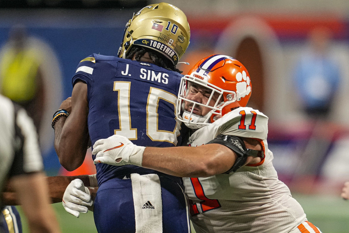 Sep 5, 2022; Atlanta, Georgia, USA; Clemson Tigers defensive tackle Bryan Bresee (11) tackles Georgia Tech Yellow Jackets quarterback Jeff Sims (10) for a loss during the second half at Mercedes-Benz Stadium.