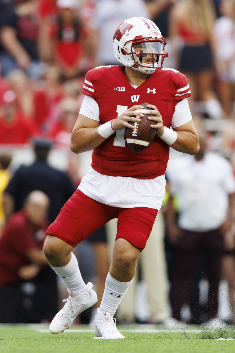Sep 17, 2022; Madison, Wisconsin, USA; Wisconsin Badgers quarterback Deacon Hill (10) drops back to pass during the fourth quarter against the New Mexico State Aggies at Camp Randall Stadium.