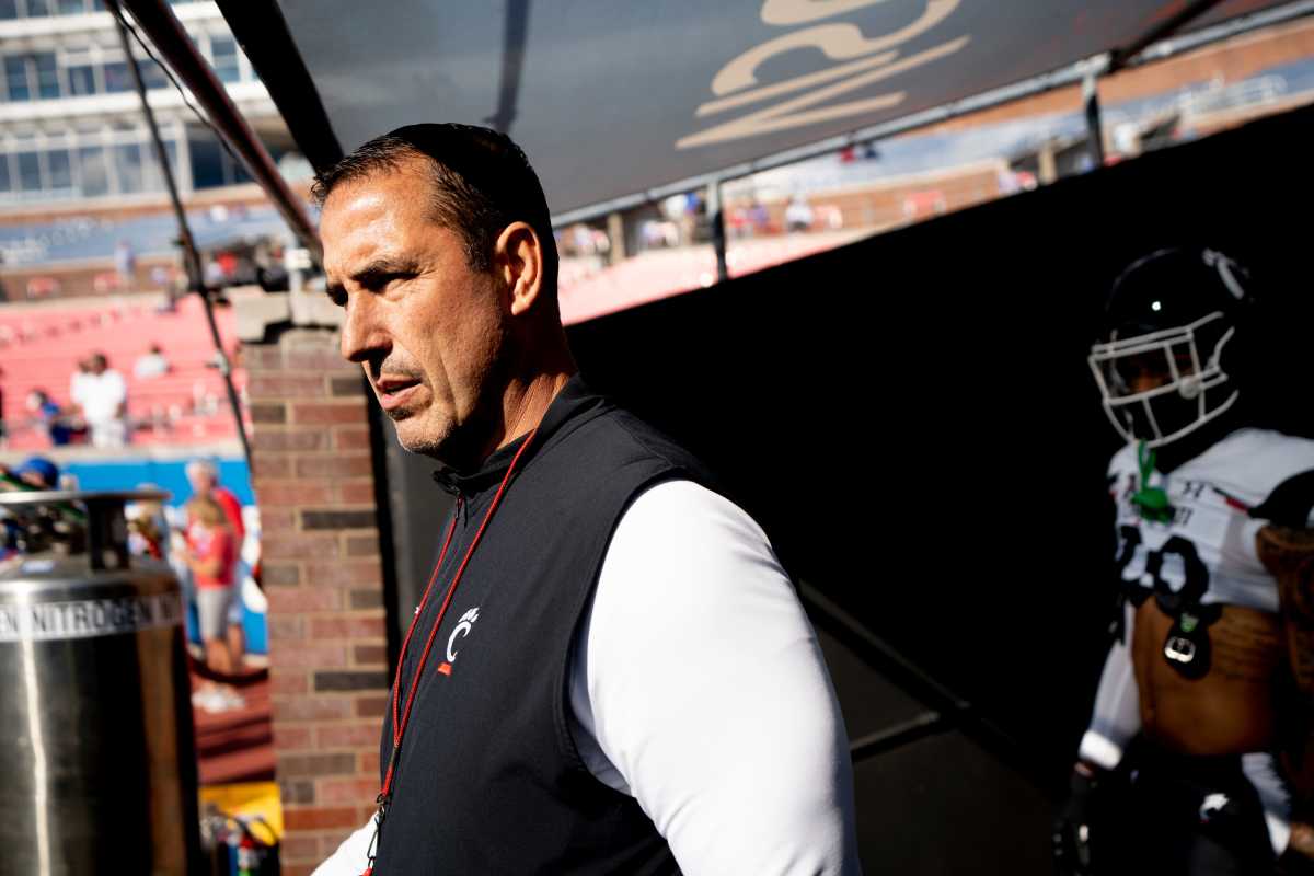 Cincinnati Bearcats head coach Luke Fickell walks onto the field before the American Athletic Conference game between the Cincinnati Bearcats and the Southern Methodist Mustangs at Gerald J. Ford Stadium in Dallas on Saturday, Oct. 22, 2022.