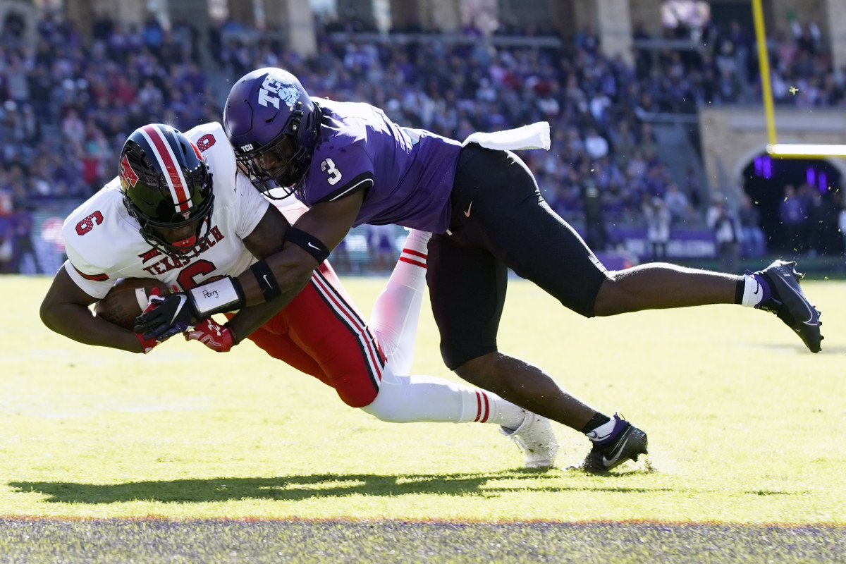 Nov 5, 2022; Fort Worth, Texas, USA; Texas Tech Red Raiders wide receiver J.J. Sparkman (6) is tackled by TCU Horned Frogs safety Mark Perry (3) during the first half of a game at Amon G. Carter Stadium. Mandatory Credit: Raymond Carlin III-USA TODAY Sports