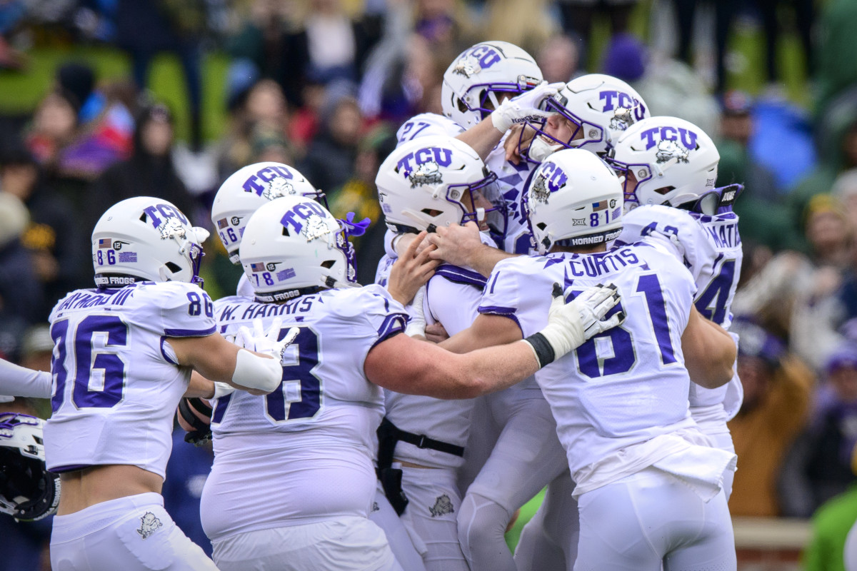 Nov 19, 2022; Waco, Texas, USA; TCU Horned Frogs place kicker Griffin Kell (39) and his teammates celebrate the victory over the Baylor Bears after Kell kicks the game winning field goal against the Bears as time expires at McLane Stadium. 