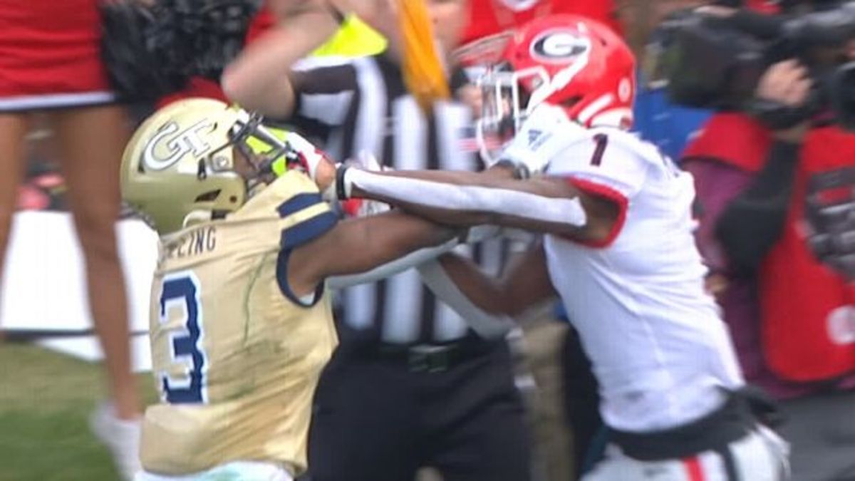 While Georgia's Dominick Blaylock scores on a nine-yard touchdown pass from Jake Fromm, George Pickens (Georgia) and Tre Swilling (Georgia Tech) brawl on the opposite side of the field, resulting in Pickens' ejection.
