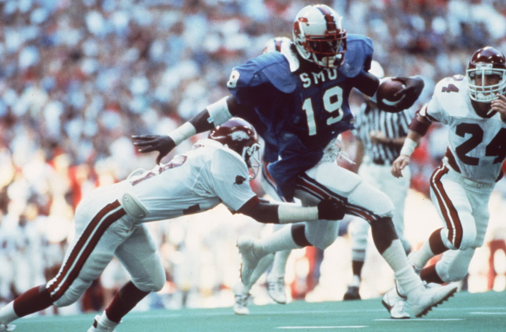 Former SMU running back Eric Dickerson was inducted into the Cotton Bowl Hall of Fame.