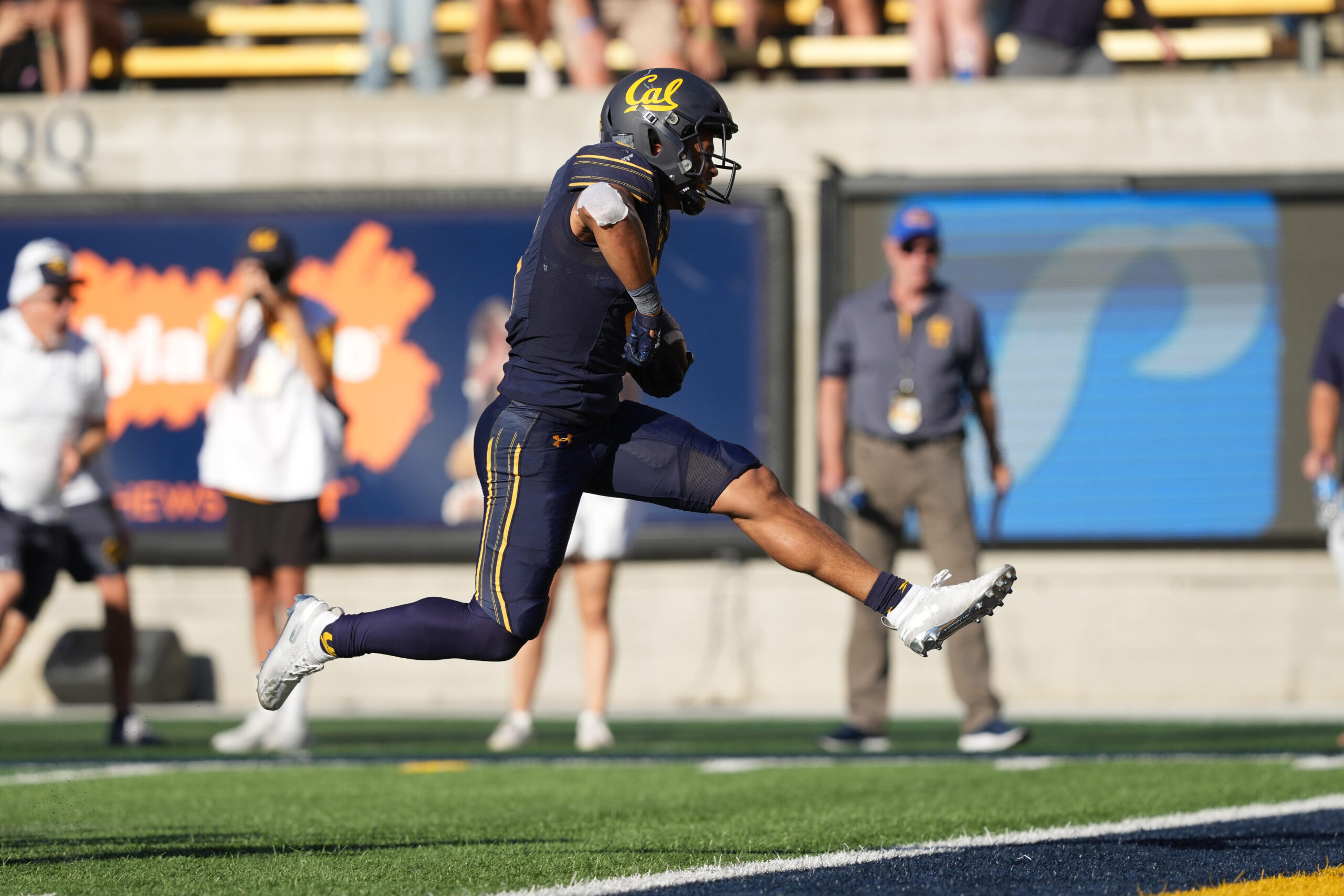 Sep 24, 2022; Berkeley, California, USA; California Golden Bears running back Jaydn Ott (6) scores a touchdown against the Arizona Wildcats during the third quarter at FTX Field at California Memorial Stadium.