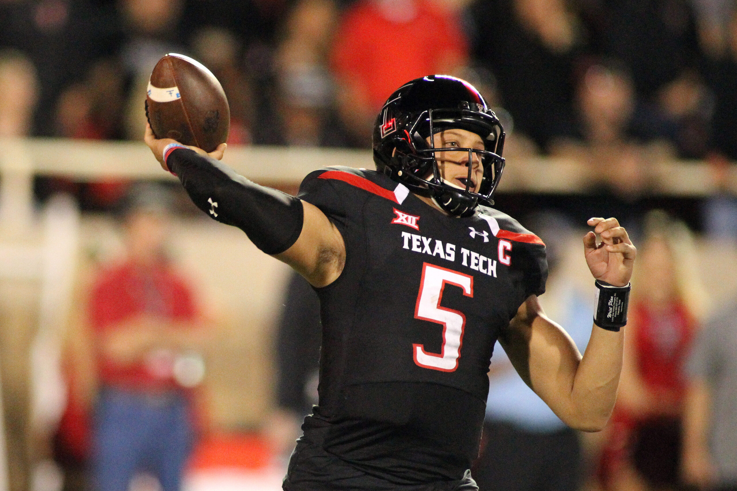 Oct 22, 2016; Lubbock, TX, USA; Texas Tech Red Raiders quarterback Patrick Mahomes (5) passes against the Oklahoma Sooners in the first half at Jones AT&T Stadium.