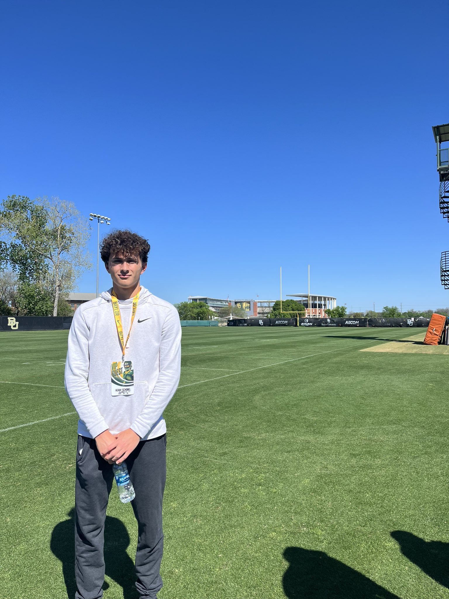 2025 MFS 3-Star QB Adam Schobel from Columbus, TX taking a picture on a visit to Baylor