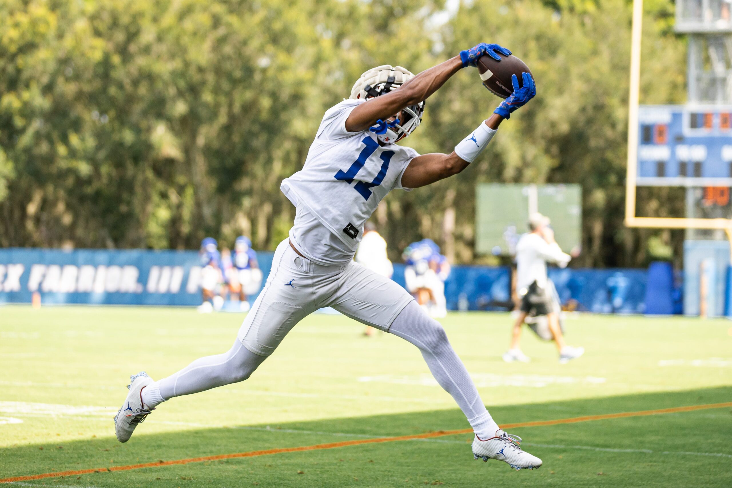Florida Gators wide receiver Aidan Mizell (11) makes a catch during fall football practice at Heavener Football Complex at the University of Florida in Gainesville, FL on Wednesday, July 31, 2024. 