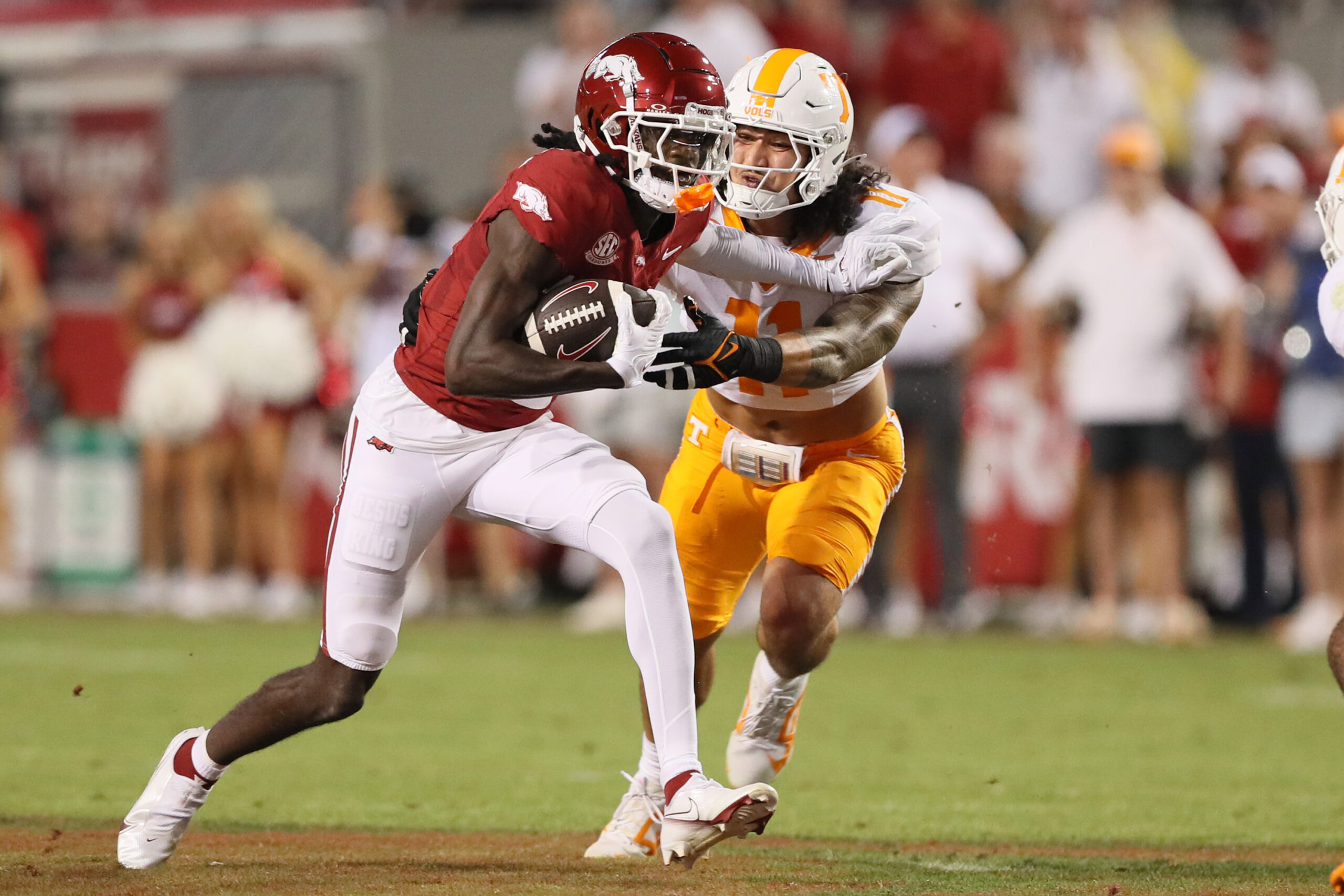 Caption: Oct 5, 2024; Fayetteville, Arkansas, USA; Arkansas Razorbacks wide receiver Andrew Armstrong (2) runs after a catch against the Tennessee Volunteers during the first half at Donald W. Reynolds Razorback Stadium.