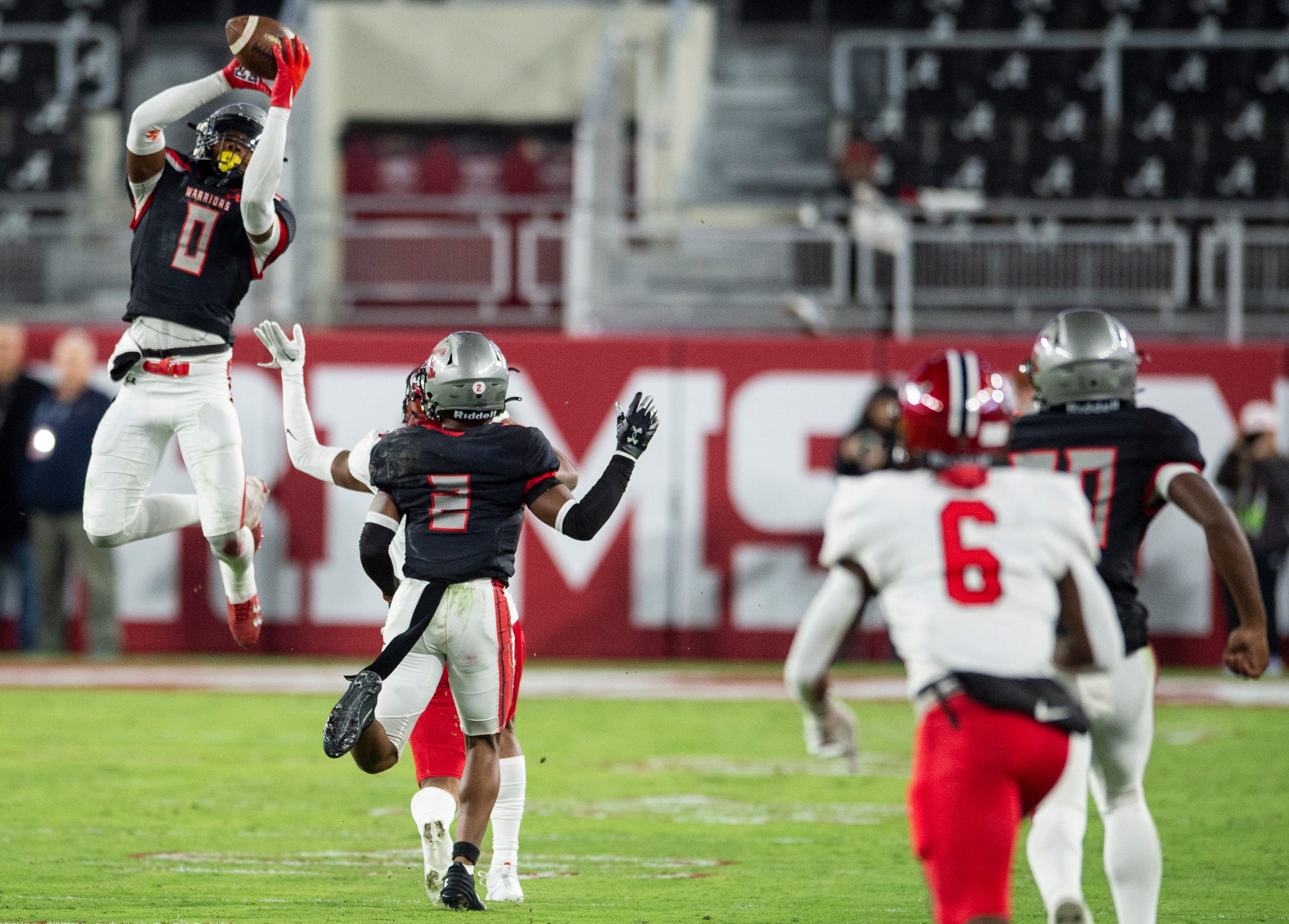 Thompson's Anquon Fegans (0) knocks down the ball as Central Phenix City faces Thompson in the Class 7A football state championship at Bryant-Denny Stadium in Tuscaloosa, Ala., on Wednesday, Dec. 6, 2023. Central Phenix City leads Thompson 14-3 at halftime.